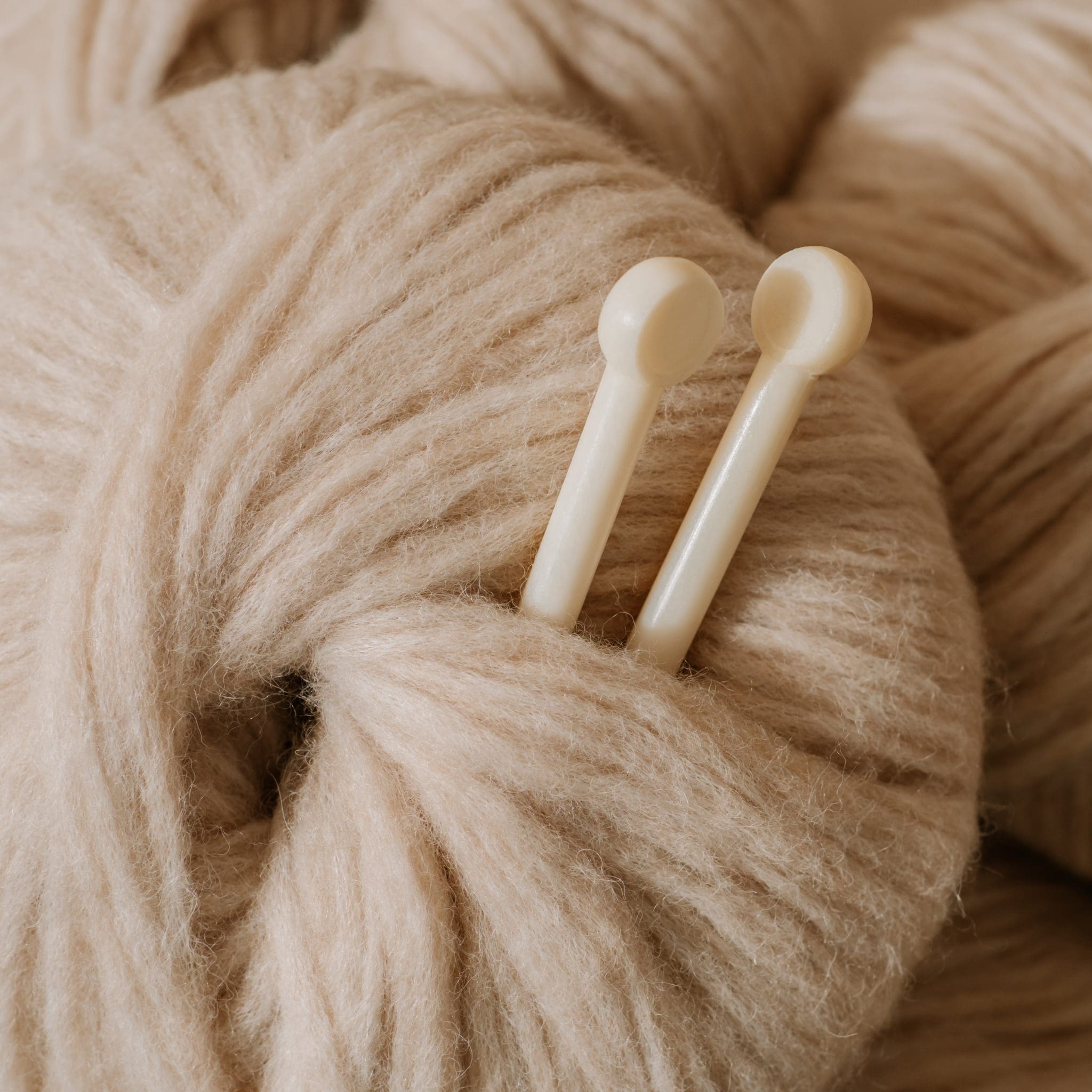 aesthetic beige yarn skein, close up